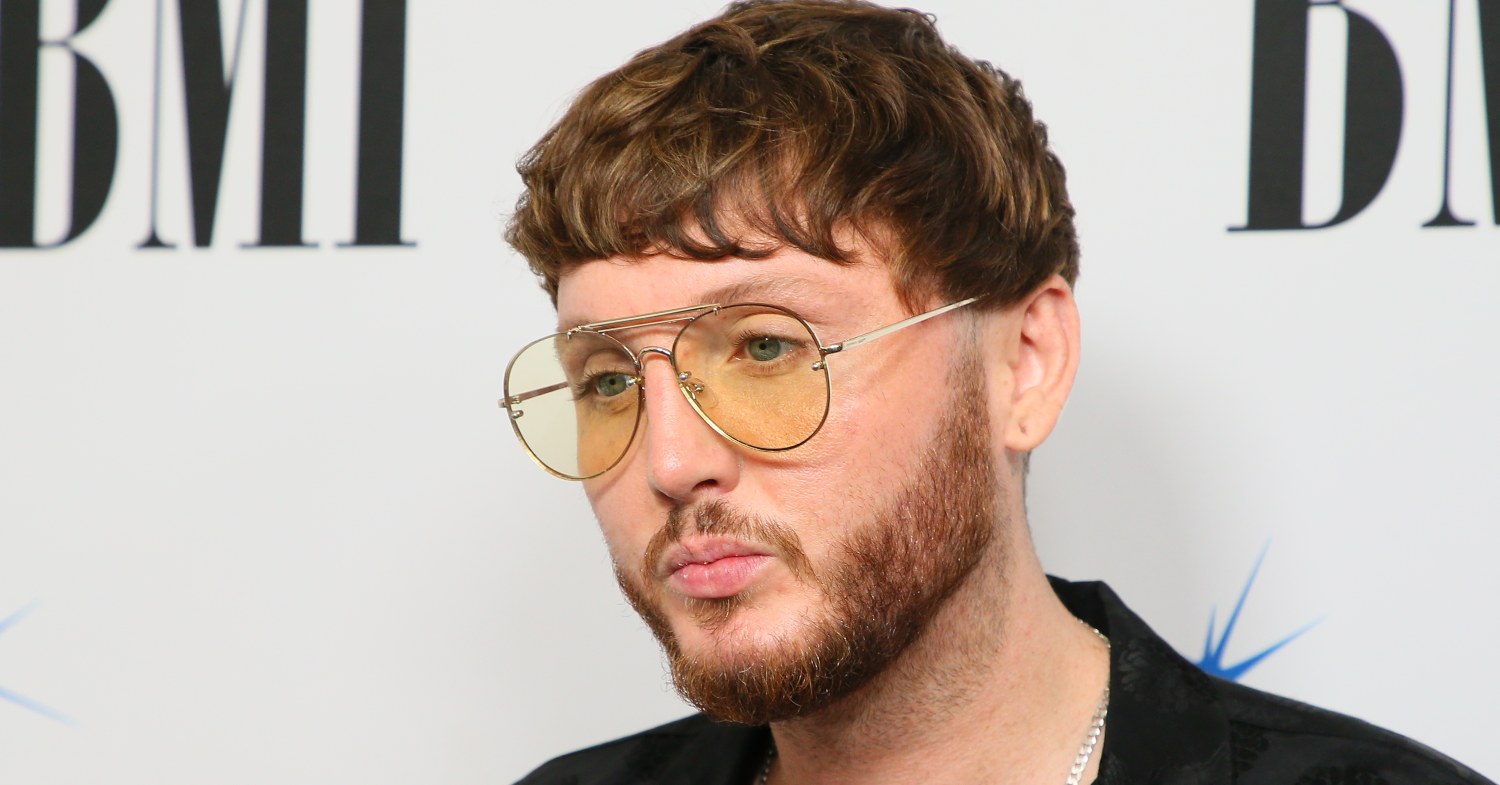 James Arthur in yellow tinted sunglasses