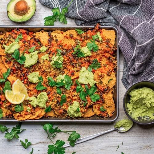 Loaded Vegan Nachos With Beans, Tomatoes and Guac
