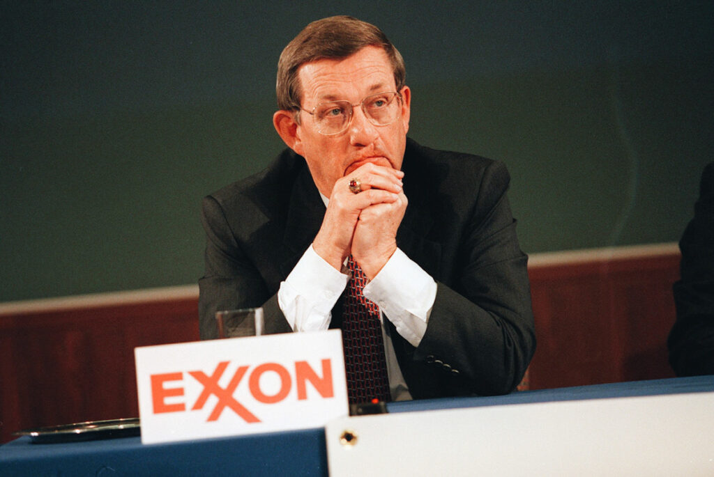 Photo shows Exxon CEO and chairman Lee R. Raymond at a press conference.