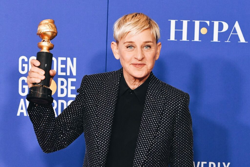 Photo showing Ellen DeGeneres holding a Golden Globe.