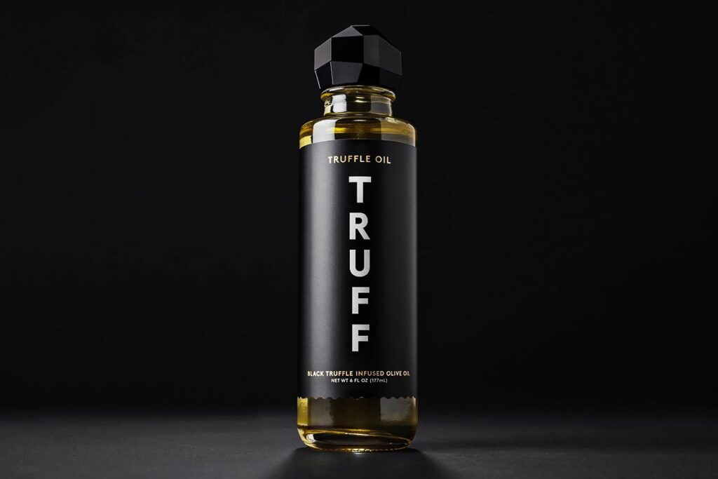 Photo shows a tall, narrow bottle of truffle oil