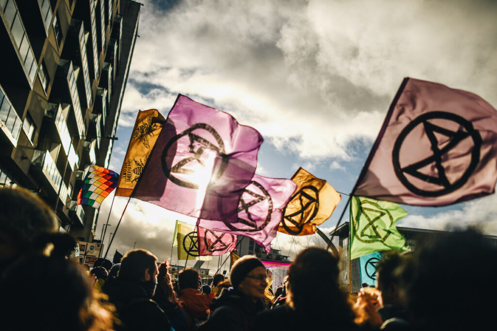 Photo shows Extinction Rebellion protesters outside the entrance to the COP26 site earlier this month.