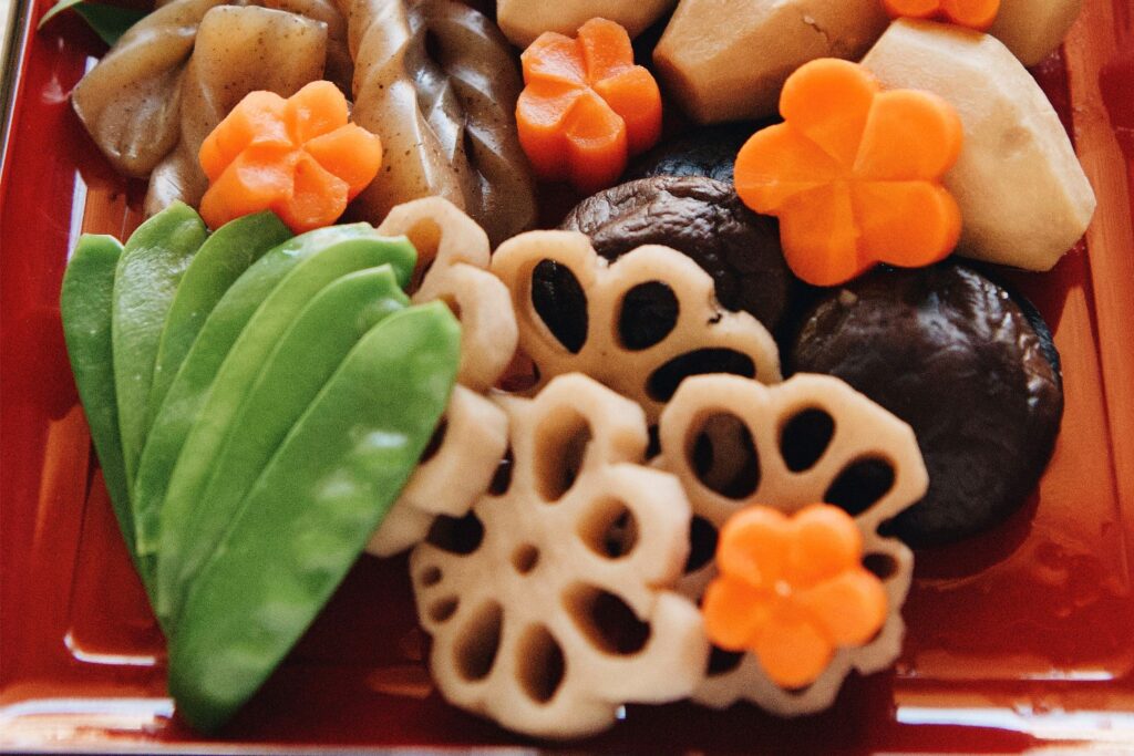 The photo shows nishime, a classic Japanese New Year's recipe.