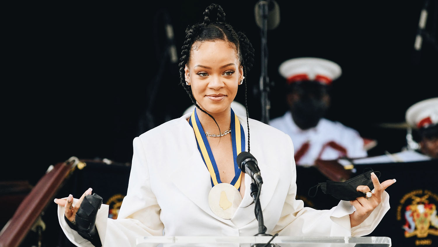 Photo shows Rihanna speaking at the National Honors ceremony and Independence Day Parade at Golden Square Freedom Park in Bridgetown, Barbados. Rihanna just donated millions to help fight climate change throughout the U.S. and Caribbean.