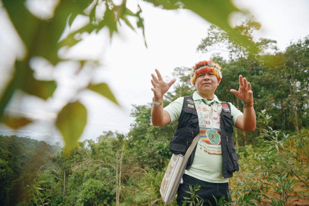 Photo shows Gregorio Mirabal, president of the Coordinator of Indigenous Organizations of the Amazon River Basin (COICA), speaking in the Ecuadorian jungle. Ecuador's Supreme Court just recognized the right of Indigenous peoples to have the final say on extraction projects.