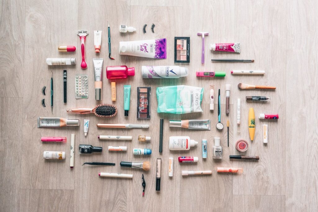 Beauty products laid out on the ground